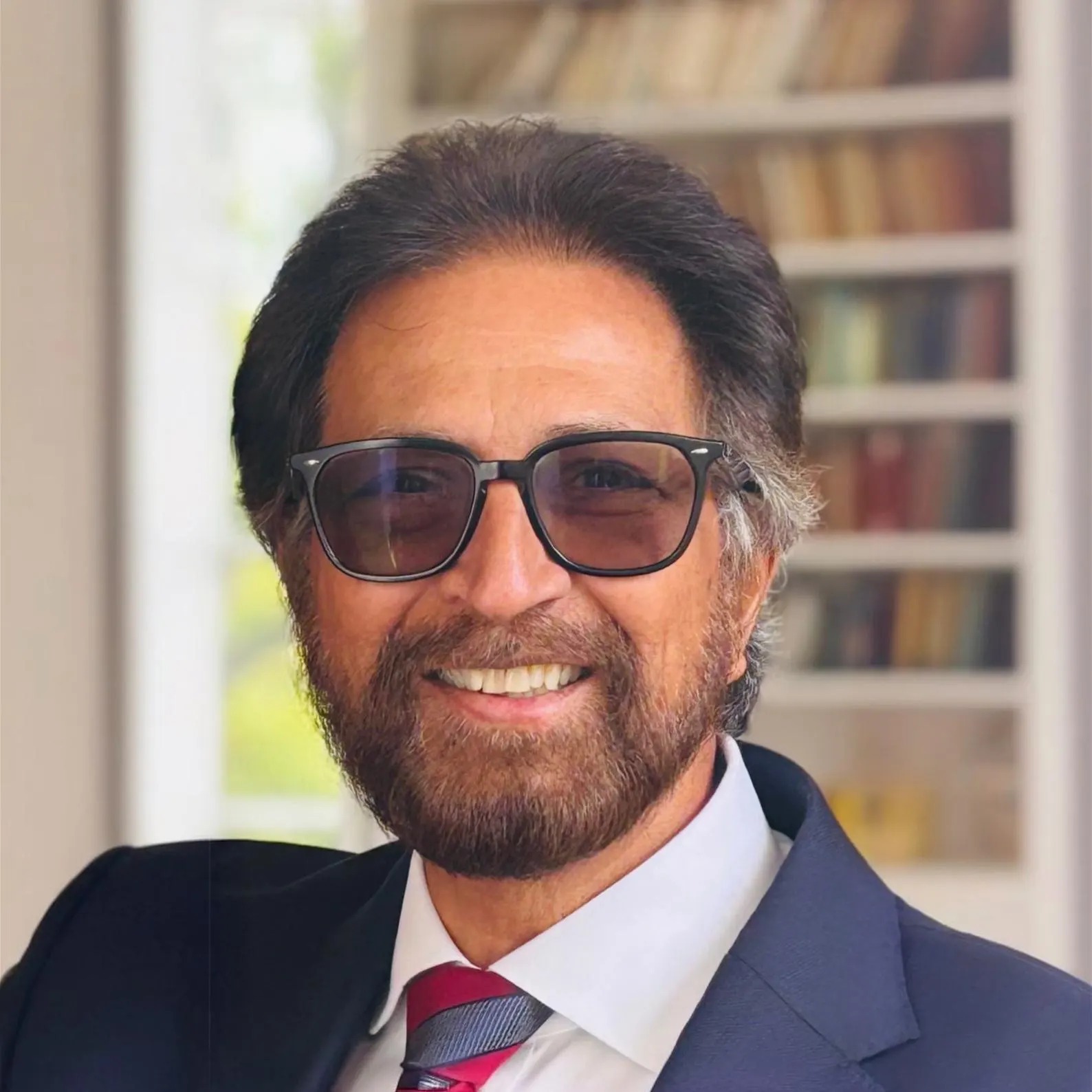 Dr. Veeraindar Goli